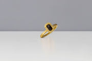 Todd Reed ring in 18 karat yellow gold with natural black diamond(.95cts) and white brilliant cut diamonds(.04cts)